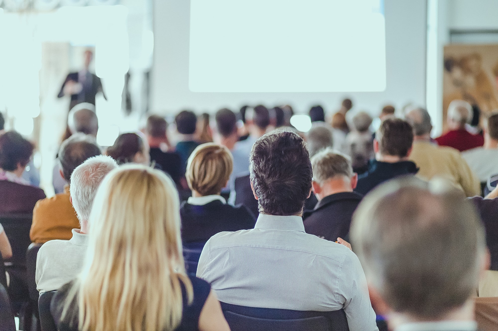 rear-view-unrecognizable-people-audience-conference-hall